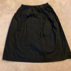 Women’s black midi skirt with *POCKETS*